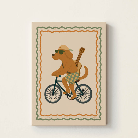 Hand-drawn dog wearing sunglasses and a cap while riding a vintage bicycle with a guitar on its back, framed with a retro decorative border, whimsical wall art for nurseries, bedrooms, playrooms, and music rooms.