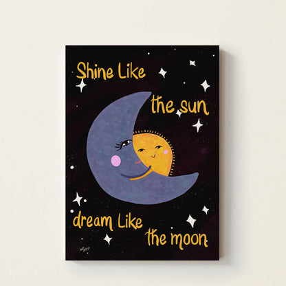 Hand-drawn smiling sun hugging a crescent moon beneath the words "Shine Like the Sun, Dream Like the Moon", whimsical celestial wall art for nurseries, children's bedrooms, playrooms, and reading corners.