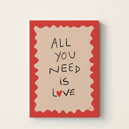 Hand-drawn typography poster displaying the words “All You Need Is Love” with a small red heart, black lettering, a neutral centre, and a bold red wavy border.