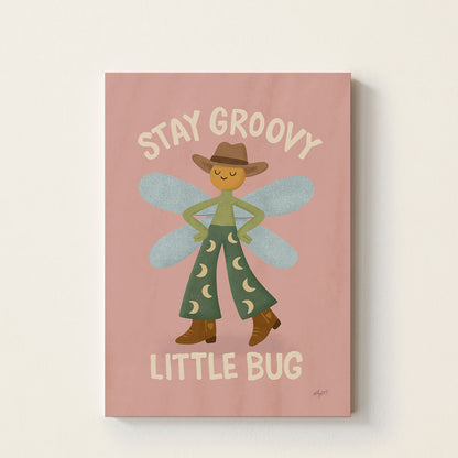 Hand-drawn dragonfly wearing a cowboy hat with the phrase Stay Groovy Little Bug, whimsical inspirational wall art for nurseries, bedrooms, and playrooms.