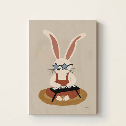 Hand-drawn bunny wearing star-shaped sunglasses while playing a small keyboard, whimsical retro-inspired music wall art for nurseries, bedrooms, playrooms, and music rooms.