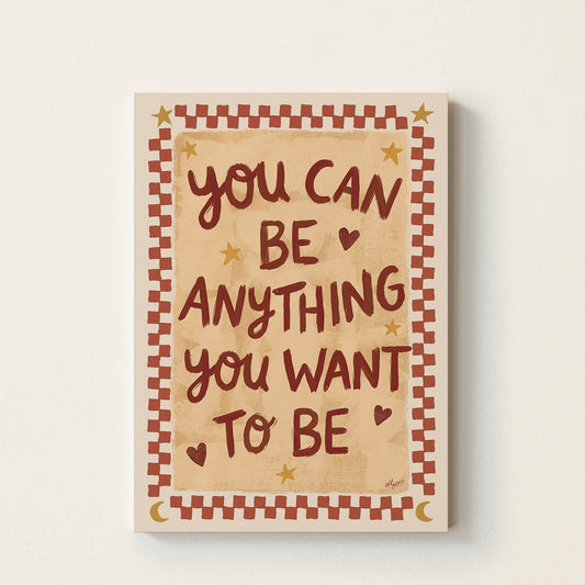 Hand-drawn typography poster featuring the inspirational message "You Can Be Anything You Want to Be" with retro-inspired decorative details, motivational wall art for nurseries, children's bedrooms, playrooms, and classrooms.