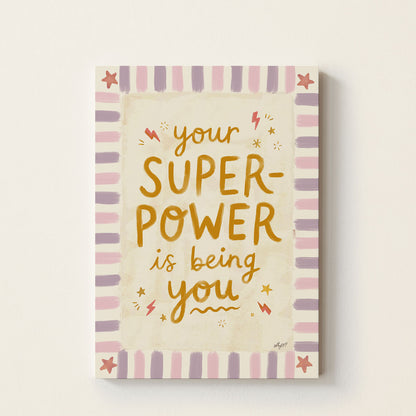 Hand-lettered inspirational poster featuring the message "Your Superpower Is Being You" in warm retro colours, positive kids wall art for nurseries, bedrooms, classrooms, and playrooms.