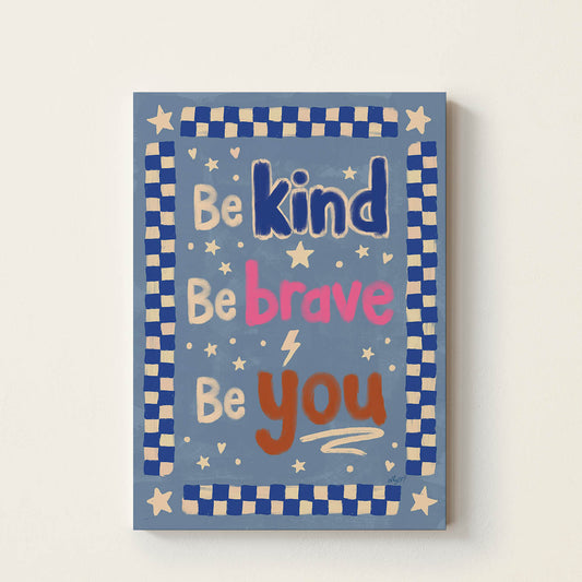 Hand-drawn blue typography poster displaying the affirmation “Be Kind, Be Brave, Be You” in colourful retro lettering with stars and a checkerboard border, positive wall art for children’s bedrooms, nurseries, playrooms, and classrooms.