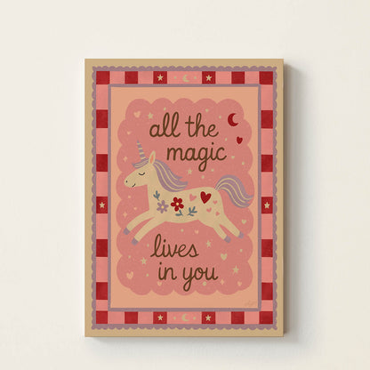 Hand-drawn unicorn surrounded by flowers, hearts, and stars with the inspirational phrase "All the Magic Lives in You", whimsical nursery wall art for children's bedrooms, playrooms, and baby rooms.