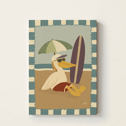 Hand-drawn pelican relaxing on a sandy beach beside a surfboard under a beach umbrella, retro-inspired coastal wall art for nurseries, children's bedrooms, playrooms, and beach houses.