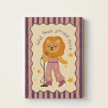 Hand-drawn lion wearing glasses and singing into a microphone beneath the inspirational phrase "Wild Heart Strong Voice", retro music-themed wall art for nurseries, bedrooms, playrooms, and classrooms.